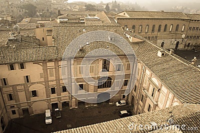Inner courtyard of Santa Maria della Scala. Siena, Tuscany, Italy. Old polar effect. Editorial Stock Photo