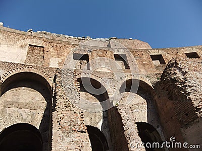 Inner wall of the ruins of the Colosseum of the Roman Empire, a tourist attraction in the city of Rome Editorial Stock Photo