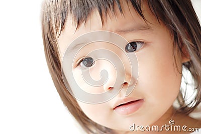 Innocent asian baby face Stock Photo