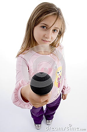 Innocent girl showing microphone Stock Photo