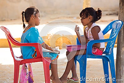 Innocent Wayuu girls playing together in Punta Gallinas Editorial Stock Photo