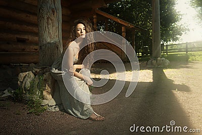 Innocent woman with flying curly hair Stock Photo