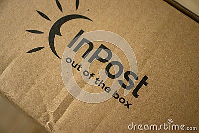 Inpost brand logo. Pack with InPost logo and sign Editorial Stock Photo