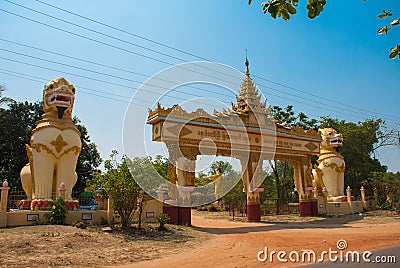 The input gate. Mya Tha Lyaung Reclining Buddha. Sculptures of mythological animals at the entrance. Chinthe. Bago. Myanma. Stock Photo