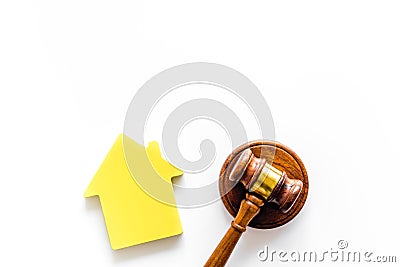 Inscribed gavel, house figure for inheritance concept on white background top view copyspace Stock Photo