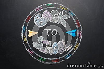 Inscription back to school with chalk on a blackboard Stock Photo