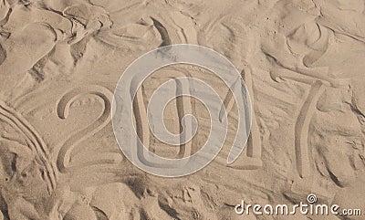 Inscription 2017 on a beach sand Stock Photo