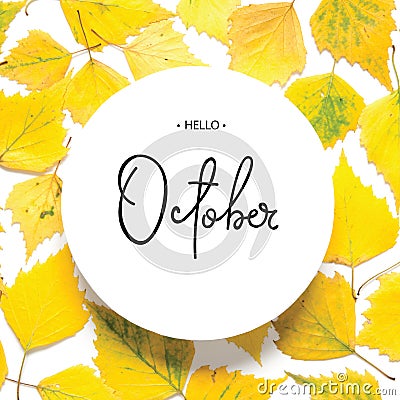 Inscription Hello October. Pattern of yellow autumn leaves isolated on white. Stock Photo