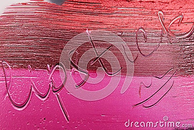 Inscription lipstick on smudged samples backdrop Stock Photo