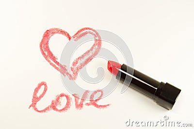 Inscription lipstick on white surface Stock Photo