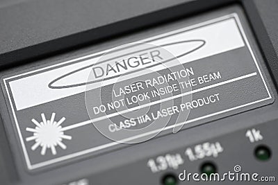 Inscription when measuring optical fiber danger laser radiation do not look inside the beam Stock Photo