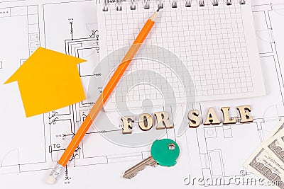 Inscription for sale, key, notepad and money on electrical diagrams, selling and buying house or flat concept Stock Photo