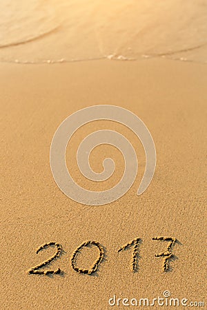 2017 - inscription on sand beach Stock Photo