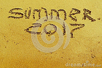 Inscription on sand summer 2017 Stock Photo