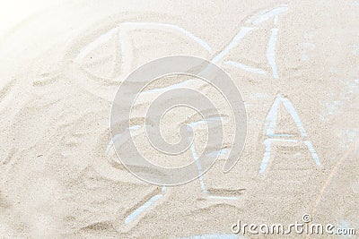 The inscription of the sea on the sand of the sea shore. Stock Photo