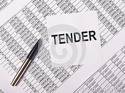 Inscription tender on paper note over business financial papers Stock Photo