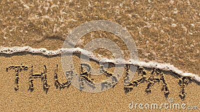 Inscription THURSDAY on a gentle beach sand with the soft wave Stock Photo