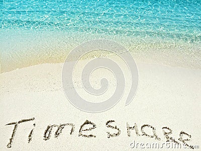 Inscription Timeshare in the sand on a tropical island, Maldives. Stock Photo