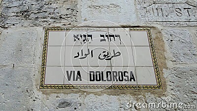 The inscription on the wall, VIA DOLOROSA, Painful path, a street sign in Jerusalem Editorial Stock Photo