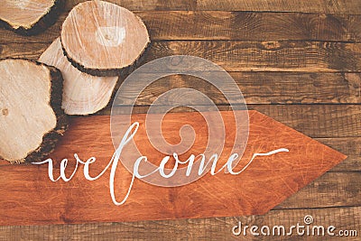 Inscription welcome on a wooden floor Stock Photo