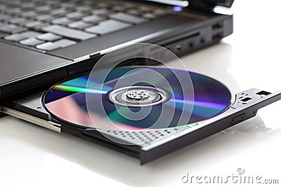 Inserting a blank CD Stock Photo