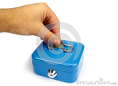 Inserting coin in blue money box Stock Photo