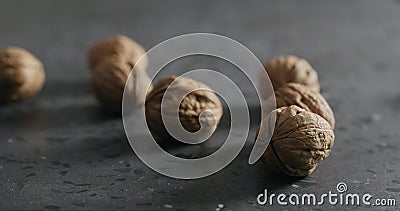 Inshell walnuts on terrazzo countertop Stock Photo