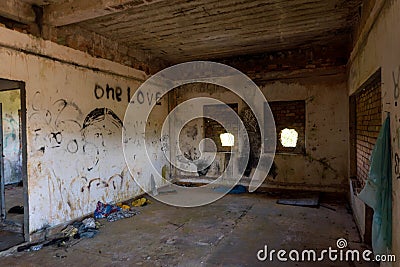 Inside an abandoned building with tags Stock Photo