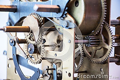 Close up vintage hand made clock interior mechanics. Gearwheels. Stock Photo