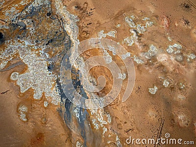 Inside a big volcano crater with gray white smoke, aerial view Stock Photo