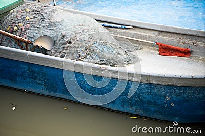 Inside boat with fishing net Stock Photo