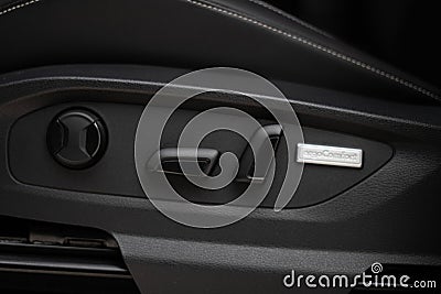 the inside of a car, showing its controls and manual buttons Editorial Stock Photo