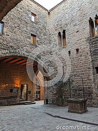 Interior patio and well of Cardona castle Stock Photo