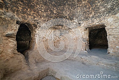 Inside the caves of Takht-e Rostam ancient buddhist stupa-monastery in Samangan, Afghanistan in August 2019 Stock Photo