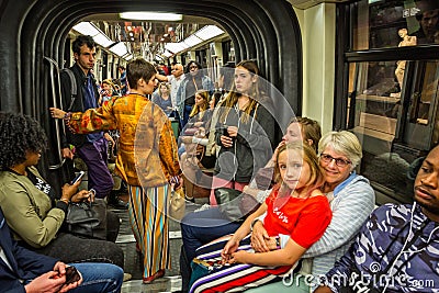 Inside a crowded Metro train on the Paris Metro system Editorial Stock Photo