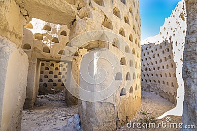 Inside crumbling dovecote mud building in Ampudia Stock Photo