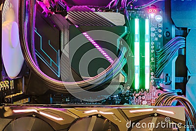 Inside Desktop PC Gaming and Cooling Fan CPU system with multicolored LED RGB light show status on working mode Stock Photo
