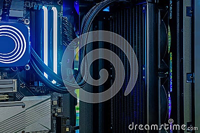 Inside Hi-performance custom computer desktop with black radiator and liquid pump that installed on socket CPU processor Stock Photo
