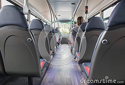 Inside interior of modern bus double decker bus showing seating and isle Editorial Stock Photo