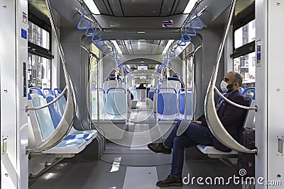 Inside of Izmir Tram, Only a few people is transporting with it because of coronavirus pandemi Editorial Stock Photo