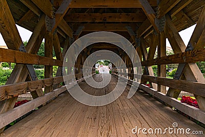 Inside a Naperville Riverwalk Covered Bridge over the DuPage River Stock Photo