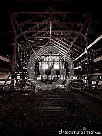 Inside an old abandoned barn Stock Photo