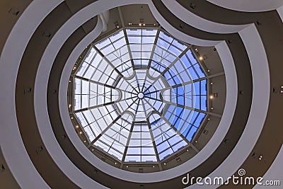 Interior winding staircase with glass rooftop of Frank Lloyd Wright famous modernist masterpiece, the Guggenheim Museum Editorial Stock Photo