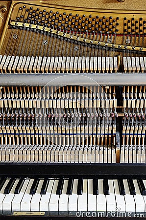 Inside the piano: string, pins, keys Stock Photo