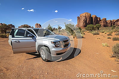 Inside the scenic Monument Valley with car Stock Photo