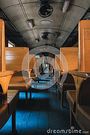 Inside of Thai Diesel Train which built in 20th century with Wooden Seats and without air conditioned Stock Photo