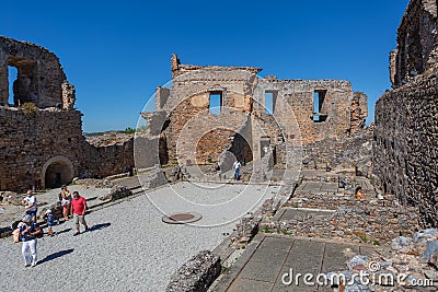 Inside view at the fortress ruins at the castle on medieval village of Figueira de Castelo Rodrigo, tourists visiting the monument Editorial Stock Photo