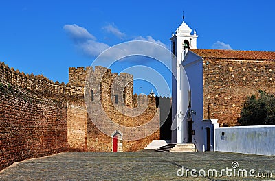 Inside the walls of Alandraol Castle with Our Lady of Grace Stock Photo