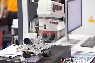 Inspection automotive part by contour measuring machine Stock Photo