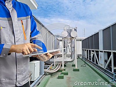 Inspection engineer air chillers the cooling towers building Stock Photo